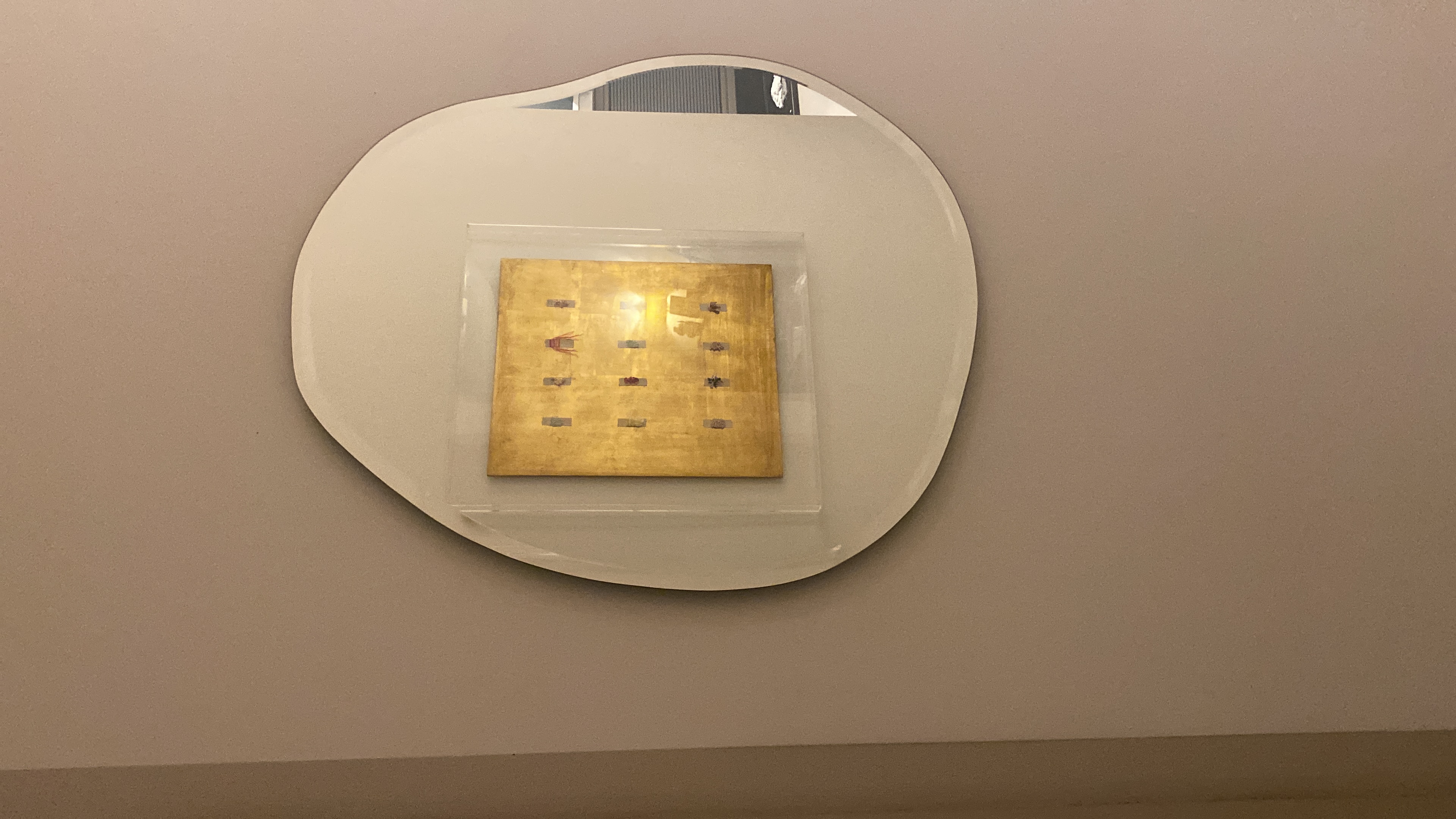 Compact acrylic box piece with hand-embroidered miniature figures in a garden arrangement