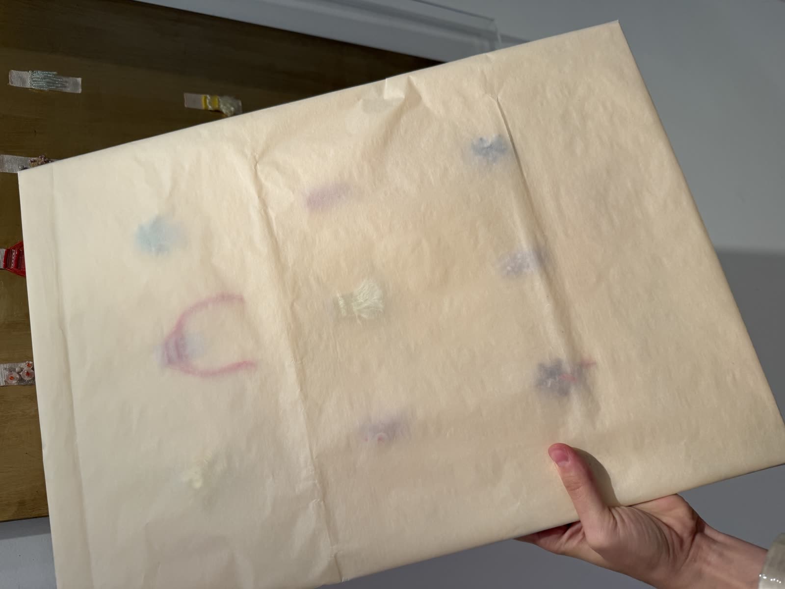 The finished piece in its packaging box, ready to be opened